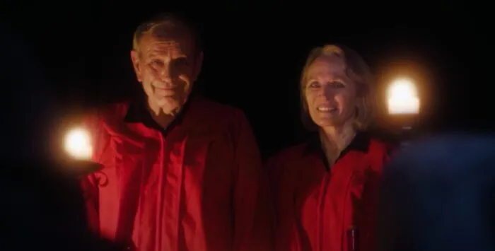 Cult leaders smiling