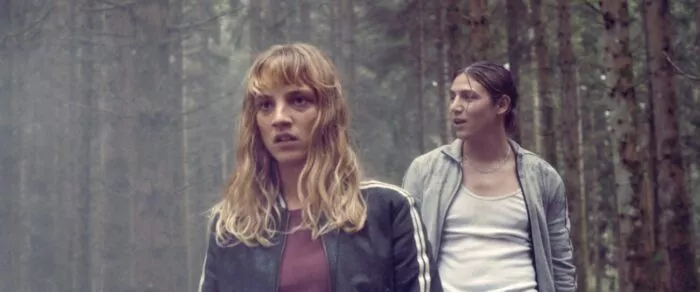 A man and a woman in the woods