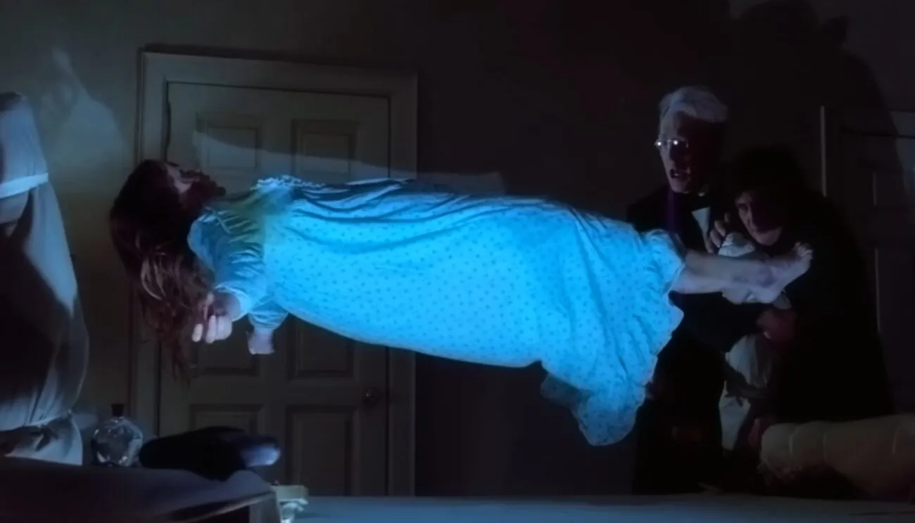 A possessed girl levitating