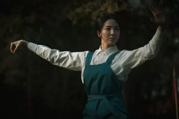 A woman practicing kung fu