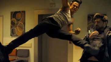 A man kicking two people at once