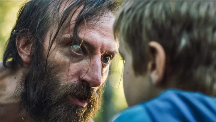 A man and his son talking