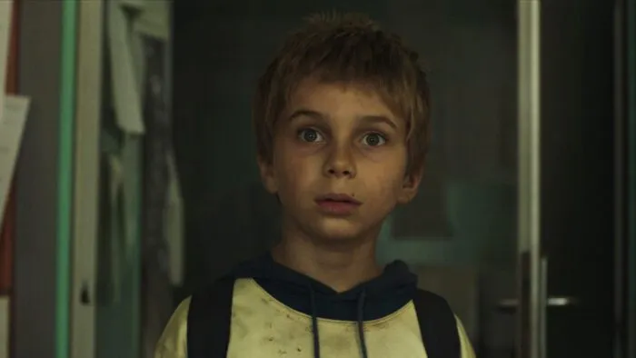 A boy looking scared