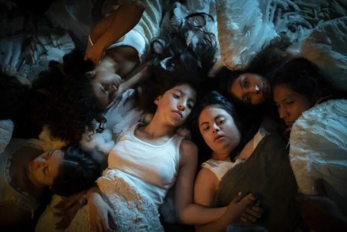 Girls lying down together