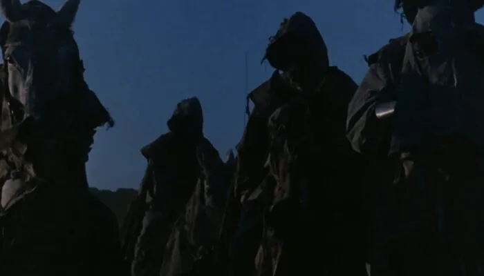 Hooded zombies riding horses