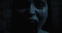 Ellen screaming with blood pouring from her eyes and mouth, from Focus Features' new movie, Nosferatu.