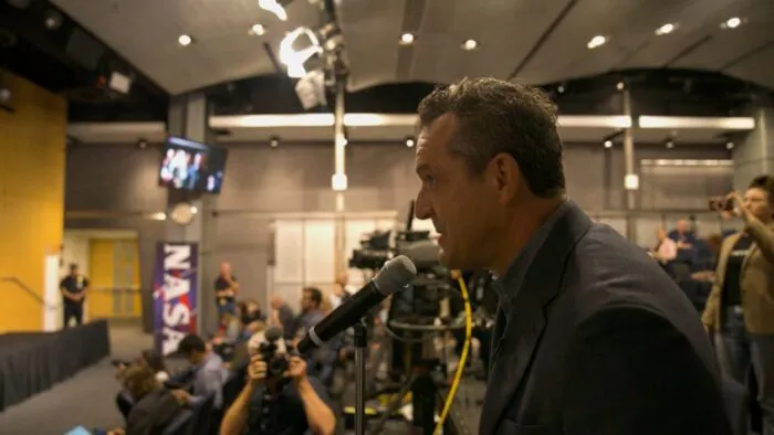 James Fox speaks at a NASA conference.