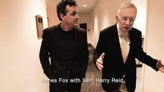 James Fox speaks with the late Senator Harry Reid.