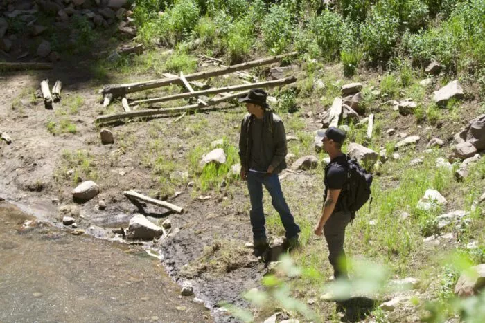 Josh Feldman and Ryan Skinner prepare to deploy the hydrophones into the waters of Pole Creek Sink to listen for the acoustic homing beacon