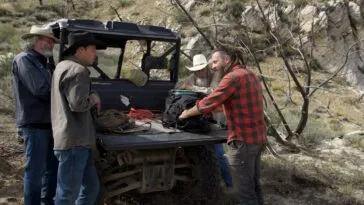 Out at the Bead Site bore hole, Chad Ollinger explains to Duane Ollinger, Josh Feldman and Charlie Snider how the acoustic homing beacon and hydrophones work