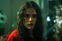 A woman with blood on her face