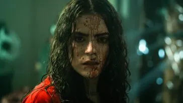 A woman with blood on her face