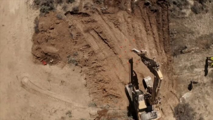 A top down shot of the rathole rig digging holes for the explosives