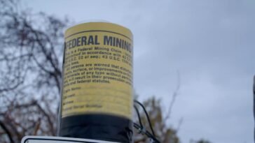 A still shot of one of the illegal mining claim signs