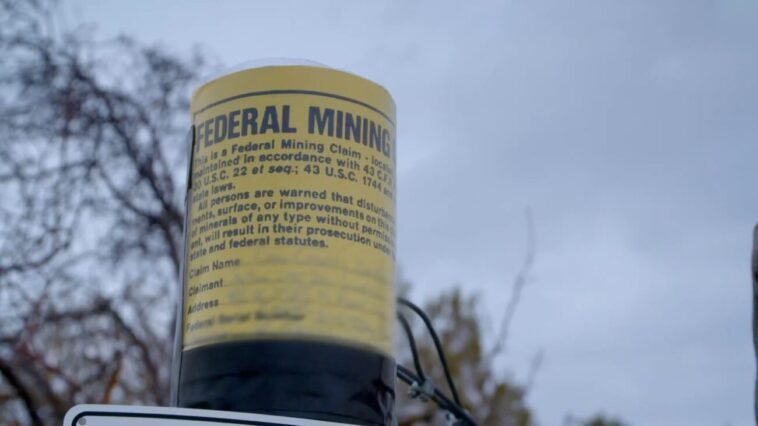 A still shot of one of the illegal mining claim signs