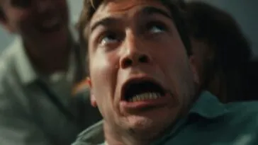 A man's face looks distressed and contorted in HOW WAS YOUR WEEKEND?