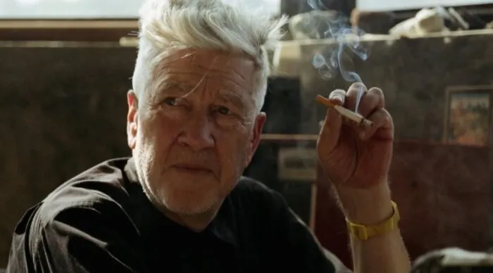 David Lynch with a cigarette in his hands