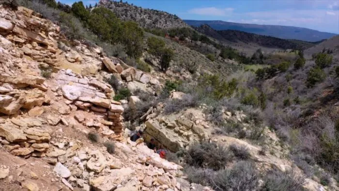 The team digs at the collapsed mine