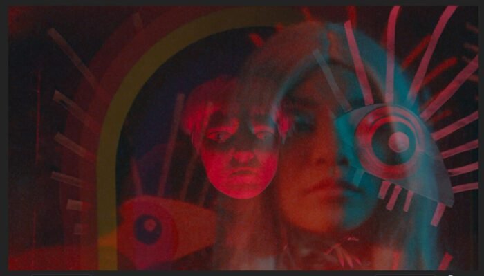 A woman's face is seen in a blue overlay on top of a red image of a woman with eyes.