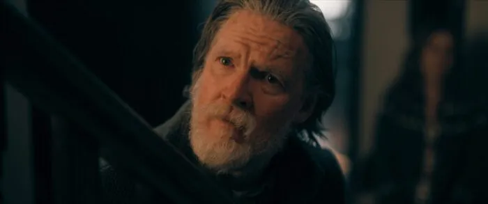 A concerned looking older man