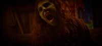 A woman with her hair down changes into a monster in A HARD PLACE