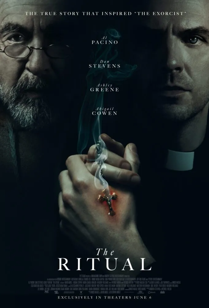 The poster for The Ritual shows the side profiles of Al Pacino on the left and Dan Stevens on the right over two hands clasped in the middle with one of them burning from being touched by a cross. 