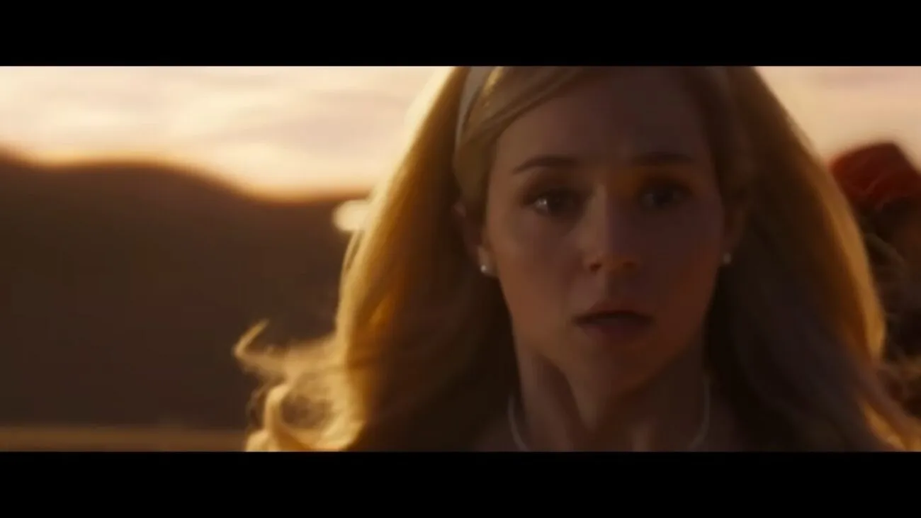 Young Iris looks on, bewildered