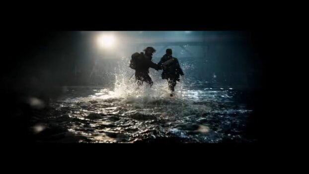 Jamie and Spike flee an alpha while looking behind them.