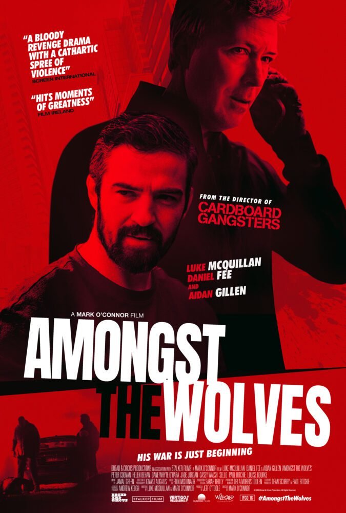 The Poster for AMONGST THE WOLVES is in red and black, showing a man talking on a phone positioned above a pensive looking man below.