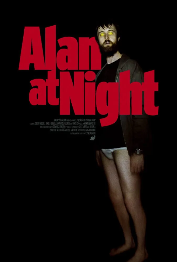 A man with vacant eyes stands in his underpants looking at the camera on the poster for Alan at Night
