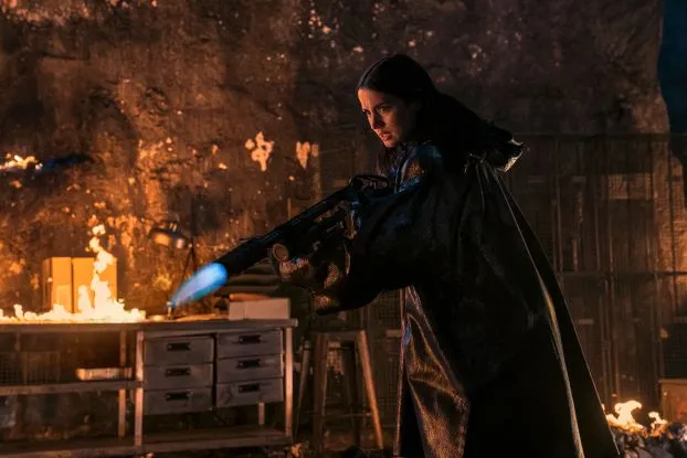 Eve is armed with a flamethrower