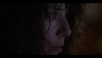 A closeup of the side of Laura's face