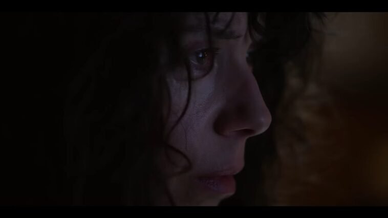 A closeup of the side of Laura's face