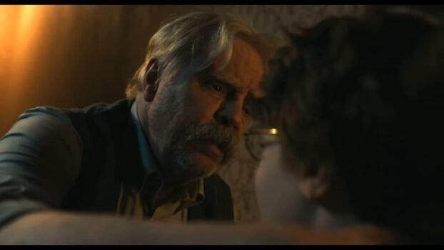 Chuck's grandpa (Mark Hamill) pulls in Chuck for a hug