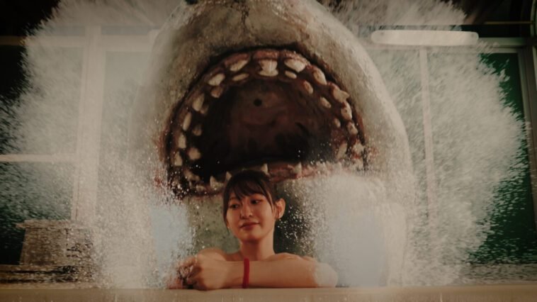 A woman texting on the phone in a bathtub has no idea a shark has emerged behind her (Hot Spring Shark Attack)