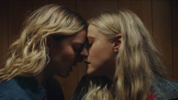 Two women rest their foreheads against one another in Abigail Before Beatrice