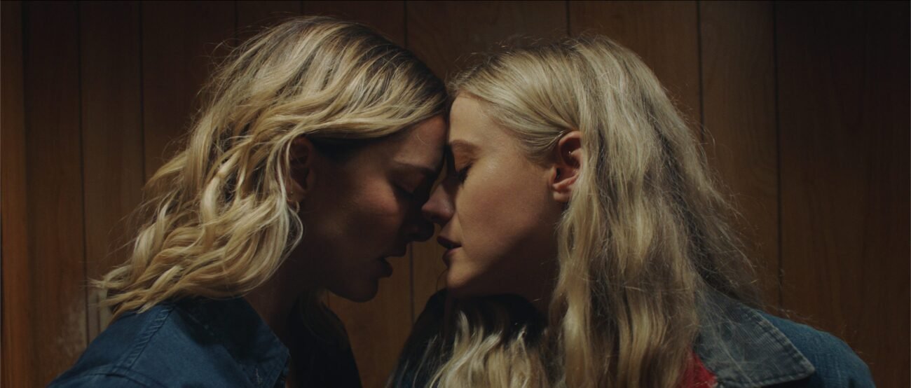 Two women rest their foreheads against one another in Abigail Before Beatrice