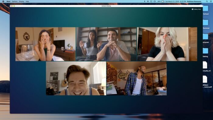 A Zoom Chat Room where most people have their hands covering their face.