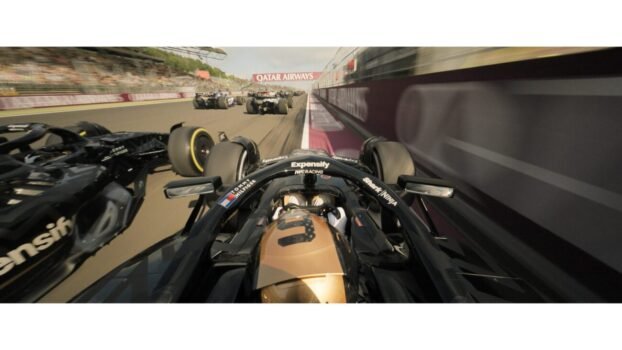 a view on a racetrack from inside the cockpit, racing quickly.