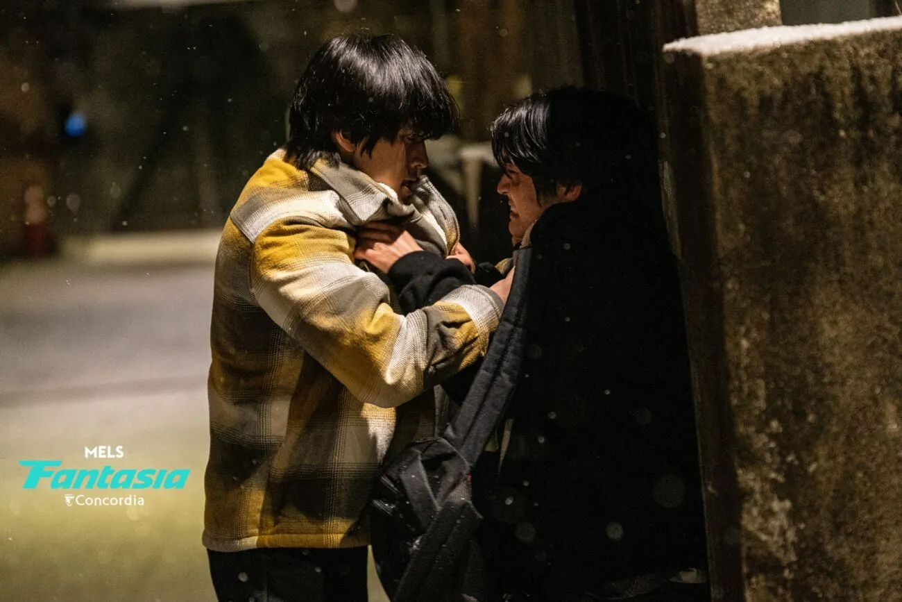 Two young men fighting underneath a street lamp (Fragment)