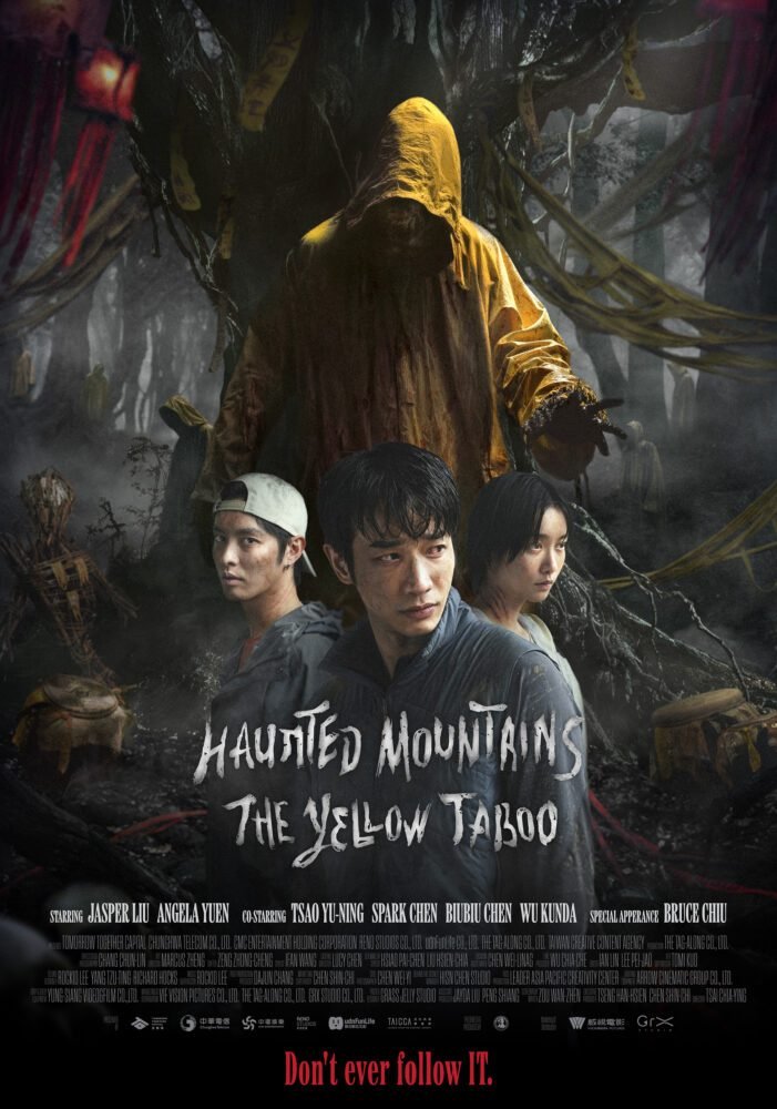 Poster for Haunted Mountains: The Yellow Taboo shows an entity in a yellow raincoat hovering above three people standing together in a dark forest.