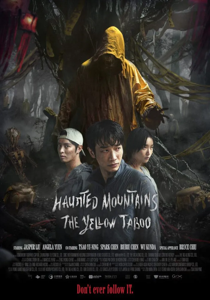 Poster for Haunted Mountains: The Yellow Taboo shows an entity in a yellow raincoat hovering above three people standing together in a dark forest.
