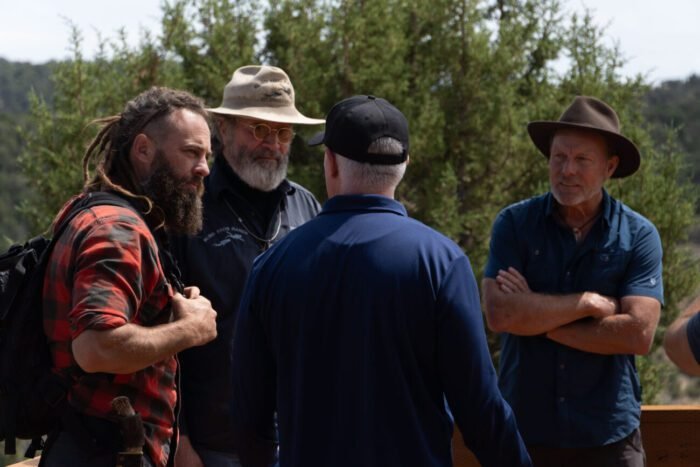 Chad and James arrive outside the Hideout and greet Duane and Eric. (Blind Frog Ranch: Spies in the Sky)