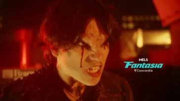 A man with a monstrous face crying blood