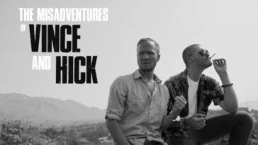A black and white banner for The Misadventures of Vince and Hick with two man sitting on top of a car in the middle of a desert.