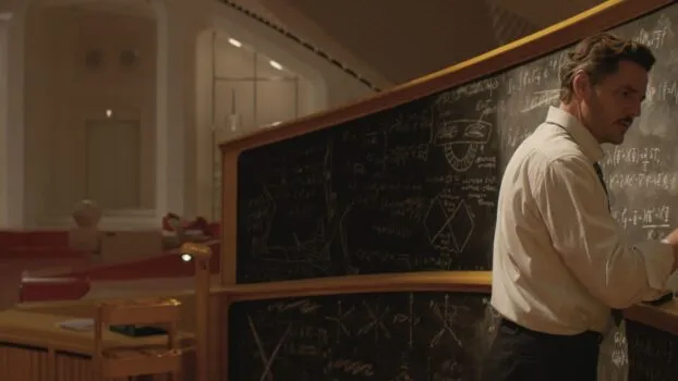 Reed Richards/Mr. Fantastic writing on a chalkboard