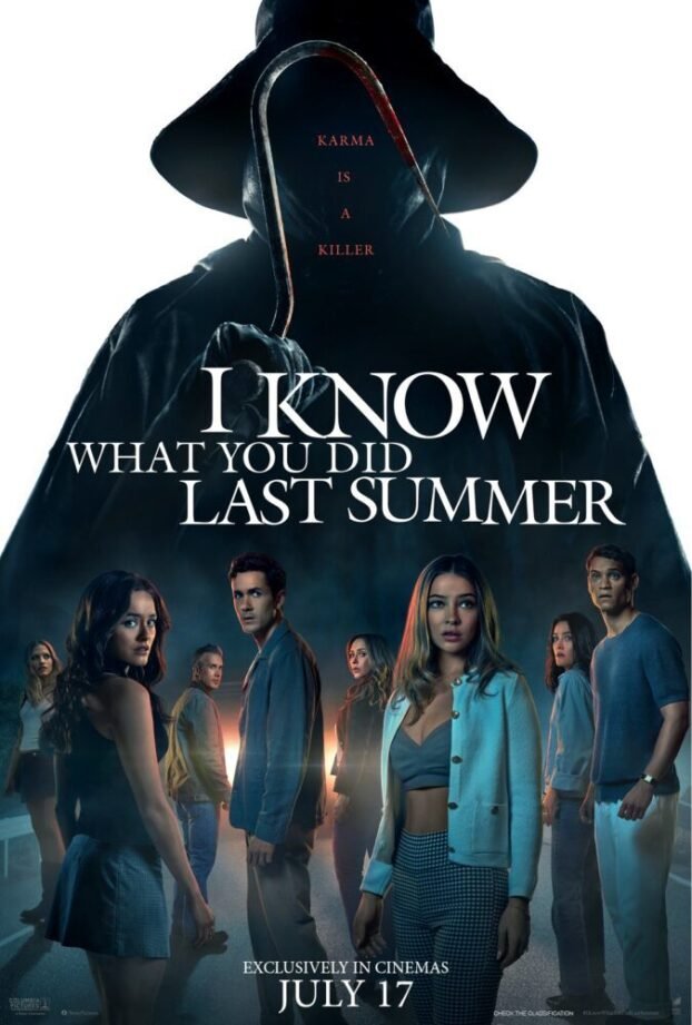 The main cast of the film stands in the silhouette of the fisherman villian.