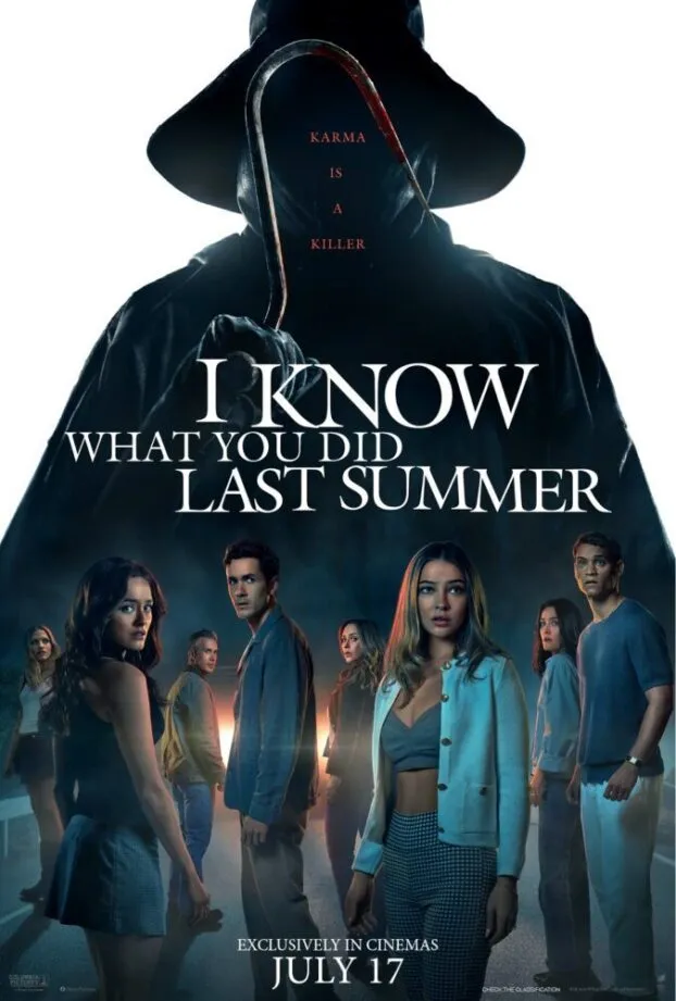 The main cast of the film stands in the silhouette of the fisherman villian.