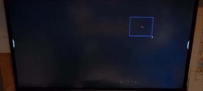 Erik highlights an odd UAP on his laptop (Skinwalker Ranch: Swarm Weather)