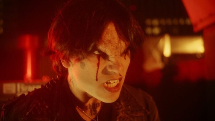 A mutated face with blood dripping from its eyes (Fantasia Presents Alice MAio Mackay's The Serpent's Skin)